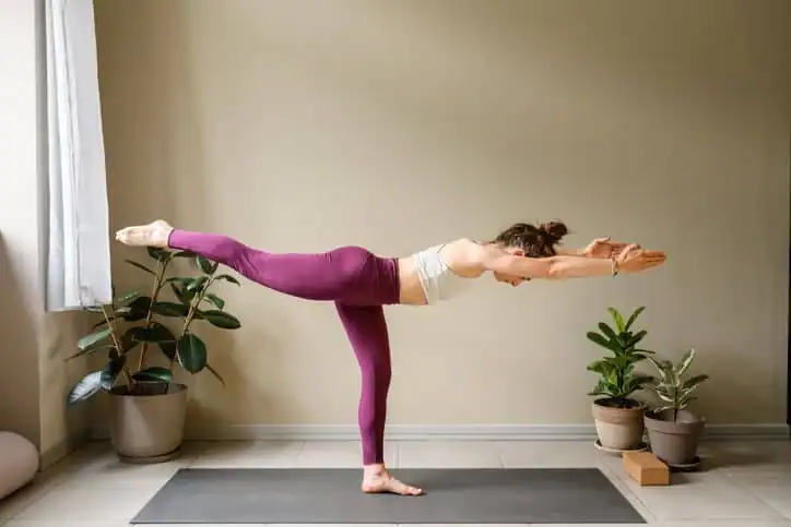 Woman doing Yoga exercise Portsmouth  to help with toning the body. 